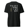 Black t-shirt with motivational text on the back against a white background